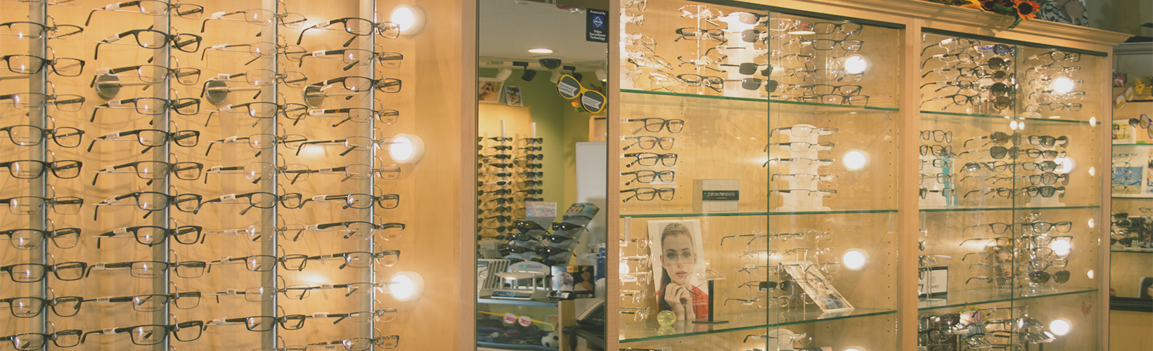 eyeglasses lot in clear glass display case