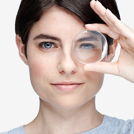 a woman holding High Prescription Lenses