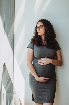 Portrait of Pregnant Woman wearing glasses