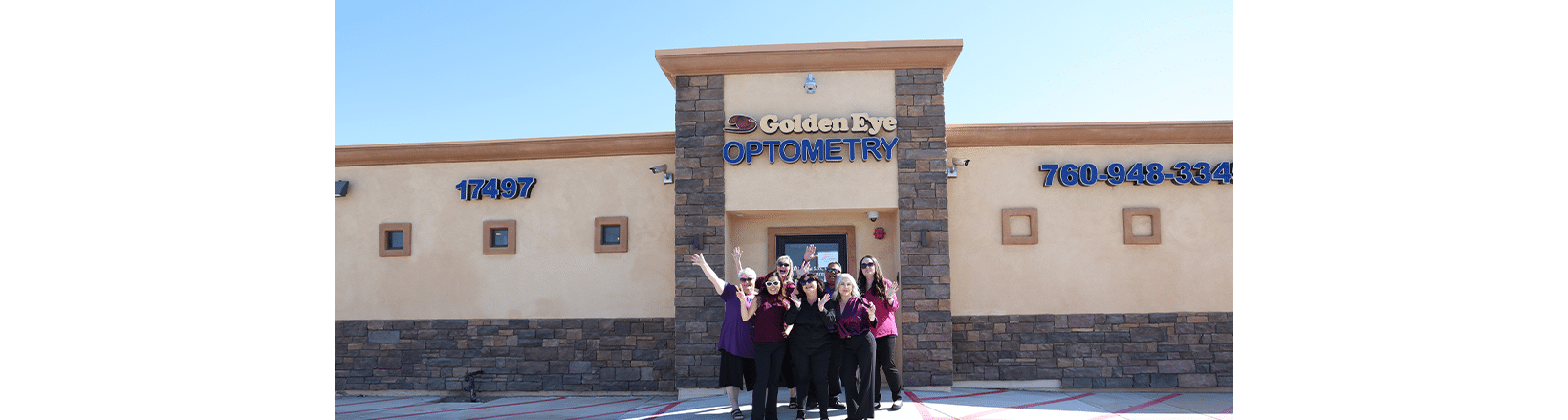 Staff picture in front of the Goldeneye optometry building